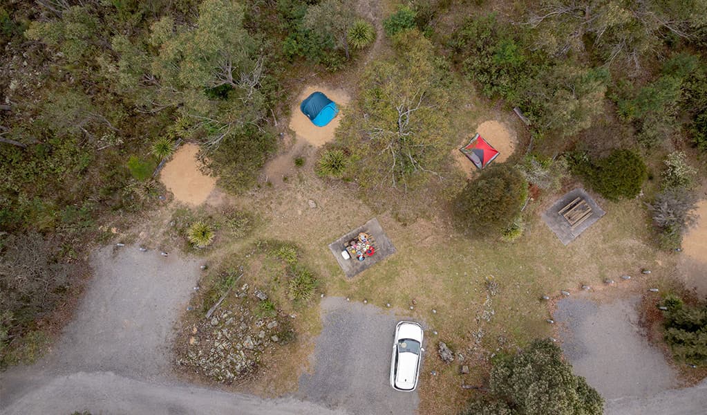 Aerial view of campsites and car spaces at Bungonia campground. Photo: John Spencer/DCCEEW © DCCEEW