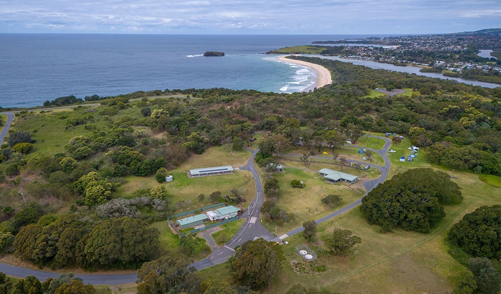 Aerial view of Killalea campground with Minnamurra Beach in the distance. Photo: John Spencer/DCCEEW © DCCEEW