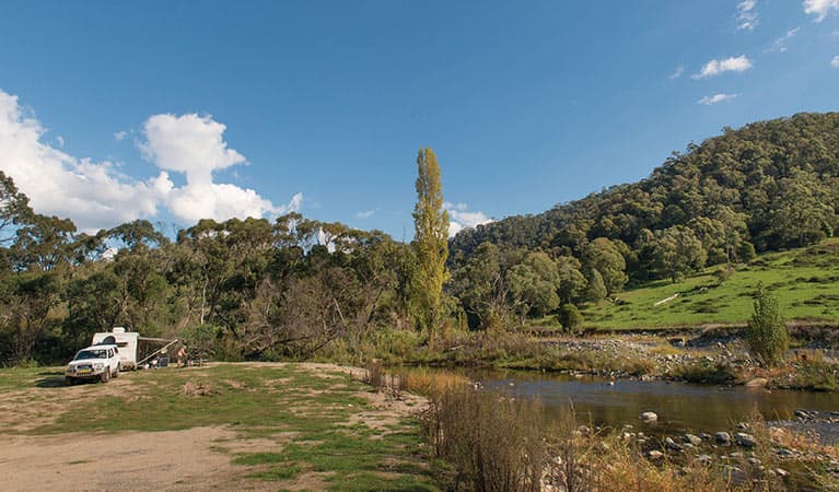 Car with caravan at Rock Flat campground, Kosciuszko National Park. Photo: John Spencer © DPIE