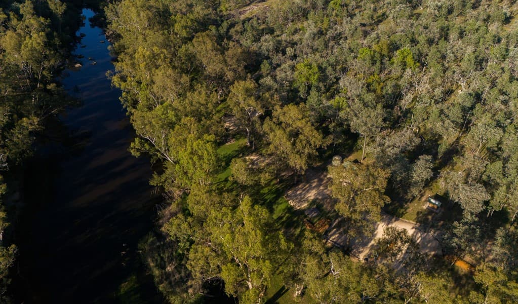 An aerial view of Kookibitta campground and the Severn River in Kwiambal National Park. Photo: Simon Scott © DCCEEW