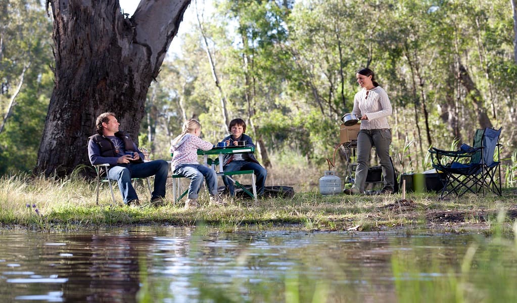 Campers by the river at Corowa campgrounds in Murray Valley National Park. Photo: David Finnegan © DPIE
