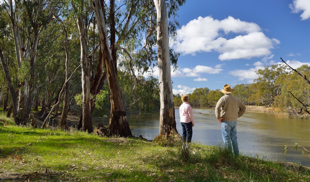 Visitors standing by the river in Murrumbidgee Valley National Park. Credit: Gavin Hansford © DPE