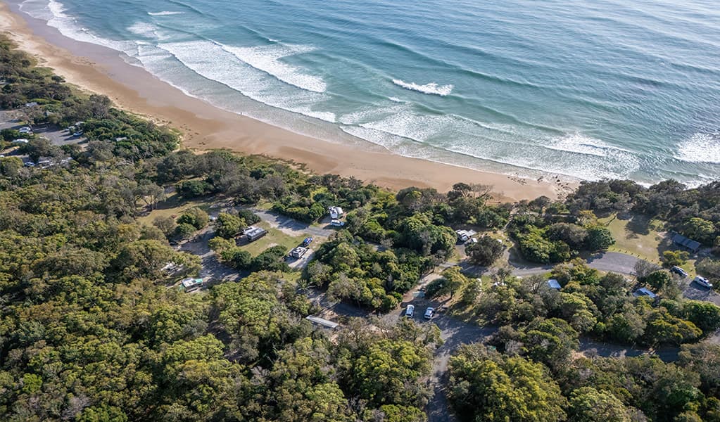 Aerial view of Illaroo campground and Illaroo-Sandon Beach. Credit: John Spencer © DCCEEW